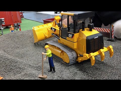 Jack plays Bruder Toys, Track Loader CAT973, feat. Johnny Evil on Probation