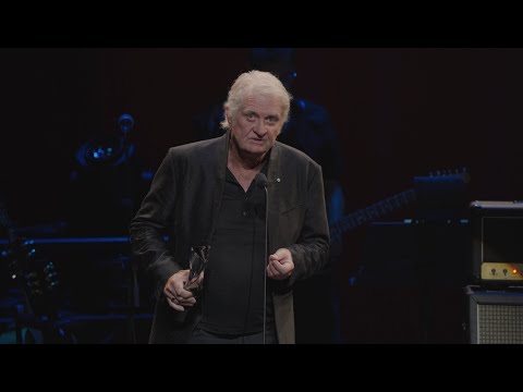 Tom Cochrane inducts Triumph into the Canadian Songwriters Hall of Fame