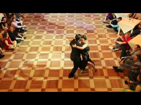  Milena Plebs  and  Sergey Sokhnenko  are  dancing  to  the  vals  "  Amor y Celos  "  by  Juan D'Arienzo  at  White Nights tango festival  in  2017