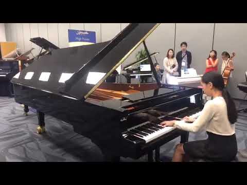 Forrest Zeng and Adriana Zhou perform