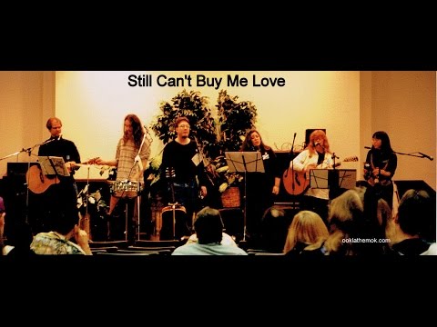 Ookla the Mok (feat. Urban Tapestry) - Still Can't Buy Me Love