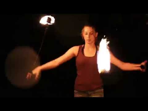 Pyro Girl fire spinning with Of The Dell - 