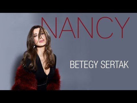 Nancy Ajram - Betegy Sertak (Official Lyric Video) -  نانسي عجرم - بتيجي سيرتك