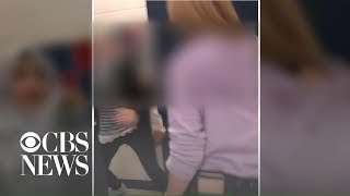 Download lagu Girl punches schoolmate who was wearing hijab... mp3