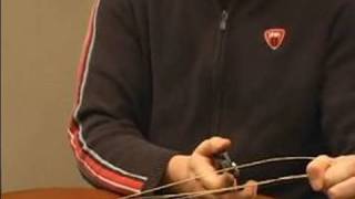 How to String a Guitar : How to Remove Guitar Strings from the Bridge