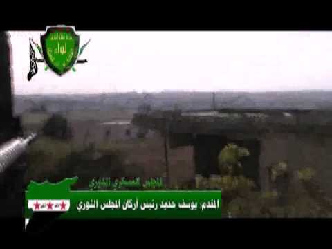 المقدم يوسف حديد رئيس أركان المجلس الثوري العسكري في حمص يقنص أحد عناصر النظام