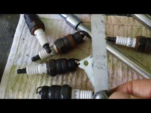 1966 Ford Thunderbird repair and refurbishment (Part 5). Spark plugs & new trunk lid weather strip.