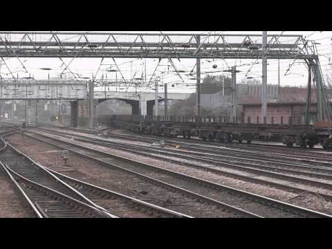 DBS Class 66 070 northbound through Doncaster Station with an empty steel train