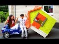 Jason play with toy ride on car and playhouse
