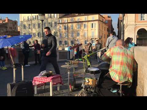 Busker Street Musician in Rome on the Tiber River Bridge
