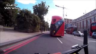 Livid cyclist hits emergency engine kill button on double decker bus in ...