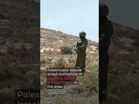 Palestinians confront Israeli settlers over land grab near Hebron