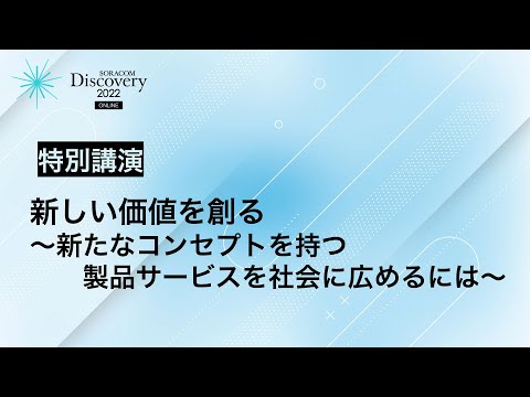 会議室のテーブルの周りに座っている人々のグループ。