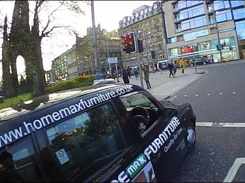 SN05HVW - Taxi driver on the phone