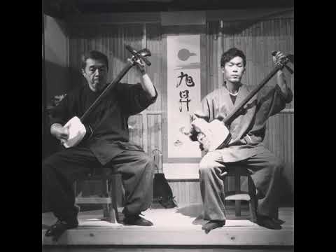 Kodai Fukui and apprentice performing the Tsugaru Shamisen