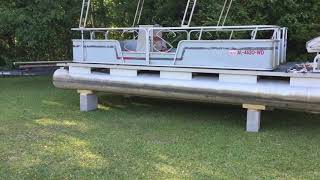 How to get pontoon boat off of trailer onto blocks part 3