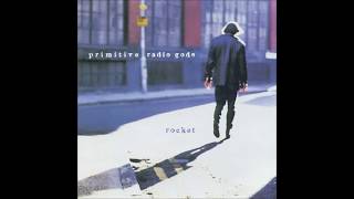 Standing outside a broken phone booth with money in my hand PRIMITIVE RADIO GODS