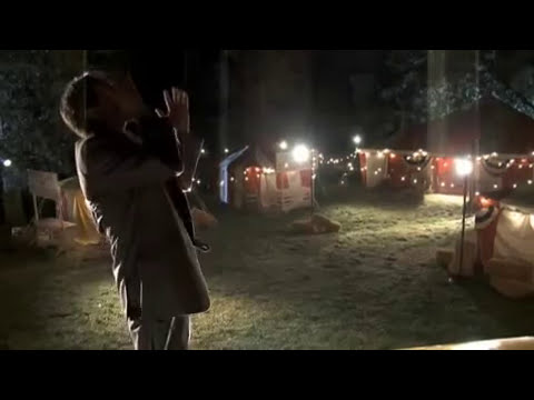 Alternate trailer frame with traveling troupe and carnival signage