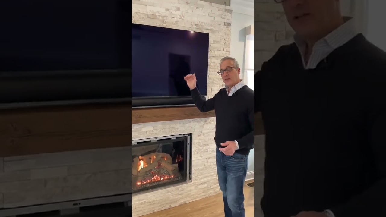 The Safest way to Install a TV over a Fireplace.#diy #fireplace #reels #design