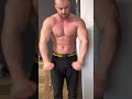 Bodybuilder showing off his MUSCLES