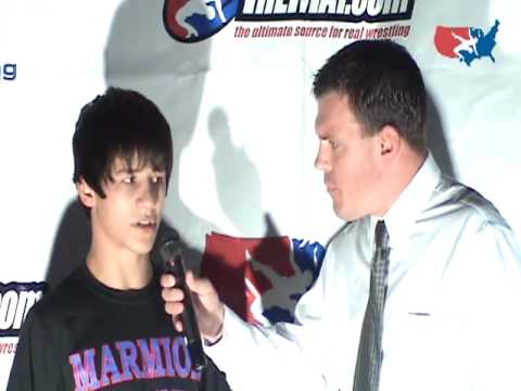 Cadet Freestyle 112 pound champion Jered Cortez of Illinois