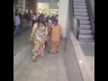 Africans use an escalator for the first time in their lives