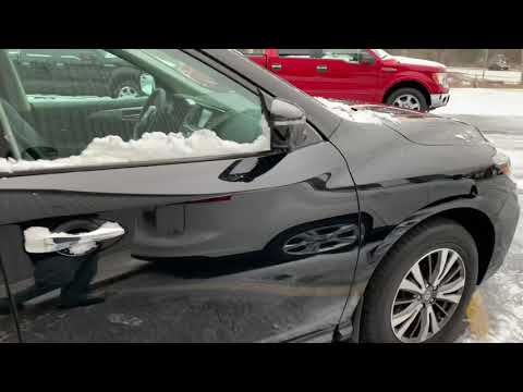 This is the 2017 Nissan Pathfinder SL 4WD with 3rd row seat at Comodo Motors