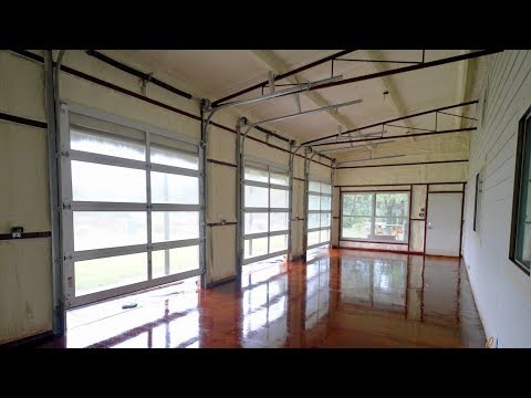 Stained concrete, foam insulation, and more rain!  - Episode 52 Texas Barndominiums
