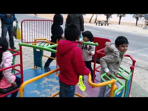 Playing in beach play ground