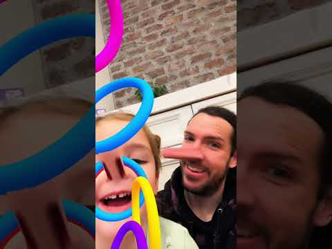 NAVEY'S CRAZY NOSE!! a silly filter makes dad & navey's noses long enough to catch colorful rings 🤥