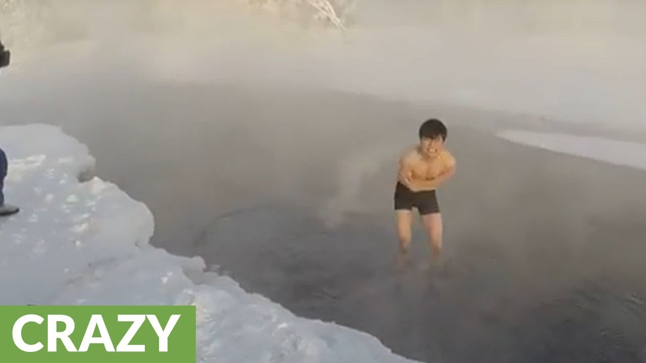 Watch this dude jumps into freezing water in -60°С (-76°F) weather!