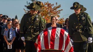 See scenes of funeral service for Deputy Ishmael