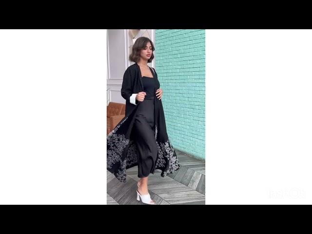 عباية كريب الملكي قمر باللون الأسود والتطريز الأبيض