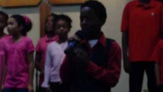 Maceo singing "God has not Forgot" by Tonex