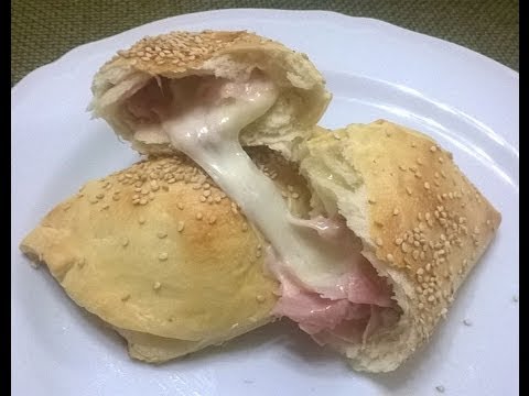 Ricetta Calzoni al forno ripieni (impasto senza burro)