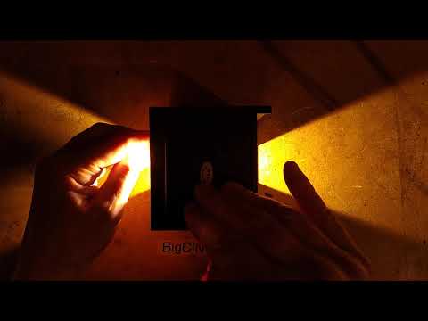 Inside an eBay "IP65" LED wall light with barn doors for light control