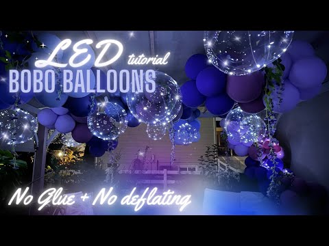 Part of a video titled Glowing LED BoBo Clear Balloons with Lights - YouTube