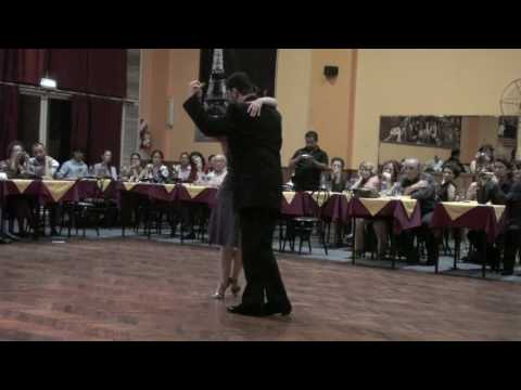  Gustavo Benzecry Sabá  and  Maria Olivera  are  dancing  to  the  tango  "  Gracias  "