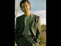 Randy Travis - Feet On The Rock