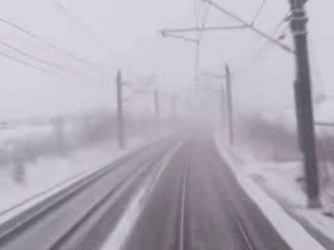 NSB-cab view of passing Stadler FLIRT Type-74/75 EMU in snow