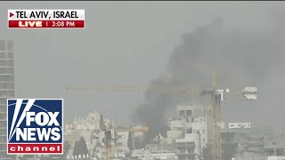 NOW: Smoke rises over Israel as Iran launches attacks
