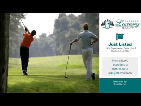 STUNNING CONDOMINIUM IN THE BEAUTIFUL BEACON WOODS GOLF COURSE COMMUNITY