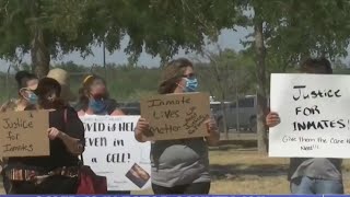 Demonstrators gather outside of Ector County jail