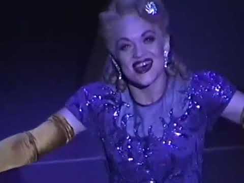 Balcony angle on Liza as 'My Ship' cadences; orchestra tucked under the vocal line