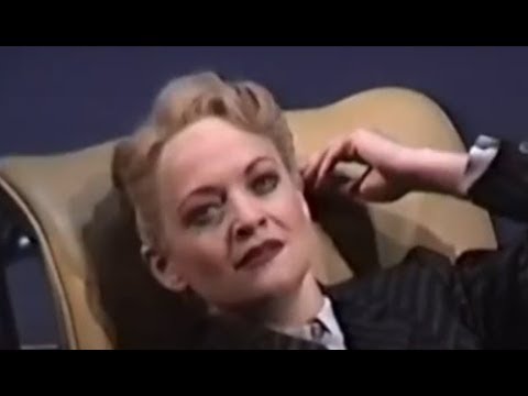 Close-up frame from the 1997 National Theatre clip: Liza turns toward the audience as the motif of 'My Ship' hovers