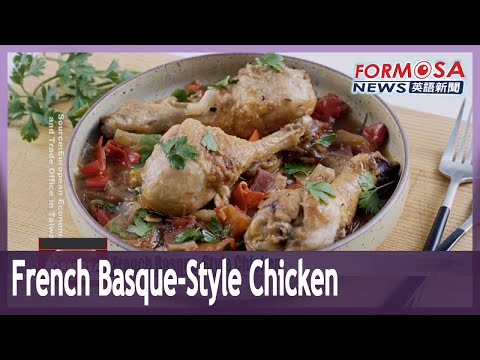 Diplomat teaches how to make Poulet a la Basquaise