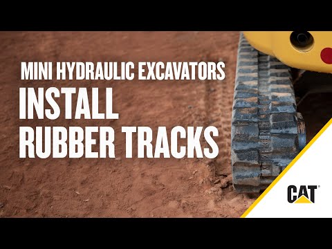 Part of a video titled How to Install Rubber Tracks on a Cat® Mini Excavator - YouTube