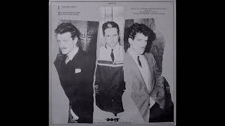 Yello – She&#39;s Got A Gun / The Evening&#39;s Young / There Is No Reason   1982