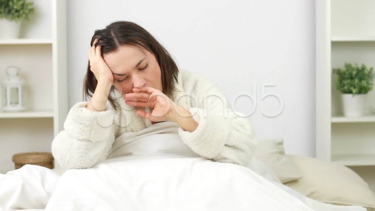 Sleepy Woman Waking Up In Bed Hd stock footage