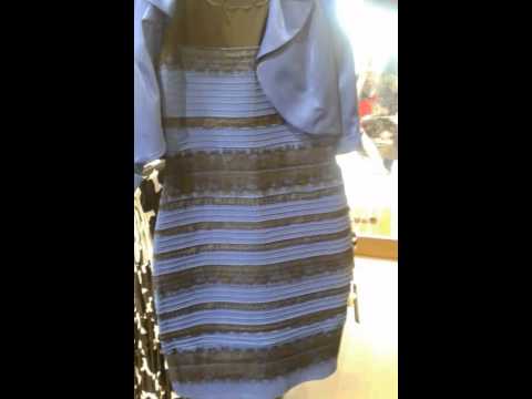 What is the color of the dress?Blue and black or white and gold?